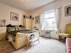 Bedroom One- click for photo gallery